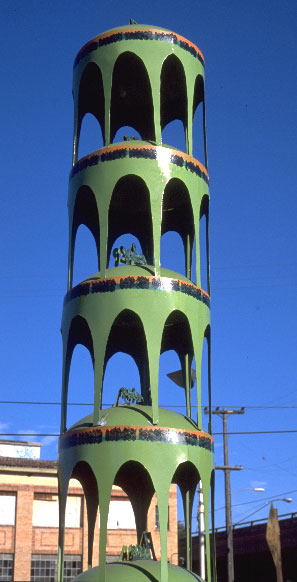 closeup of top green tower