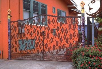 metal gate with squiggly lines and cutouts 