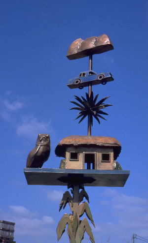  house sculpture fashioned like weather vanes 